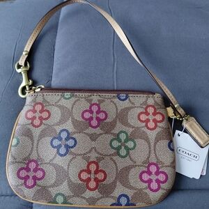 Coach Floral Pattern Wristlet with Tan Strap